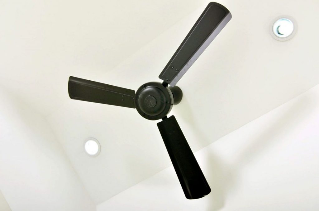 Black ceiling fan between two downlights | Dawson Electric
